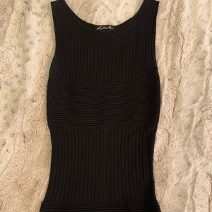 In good condition. Bought from Cache. Runs small.